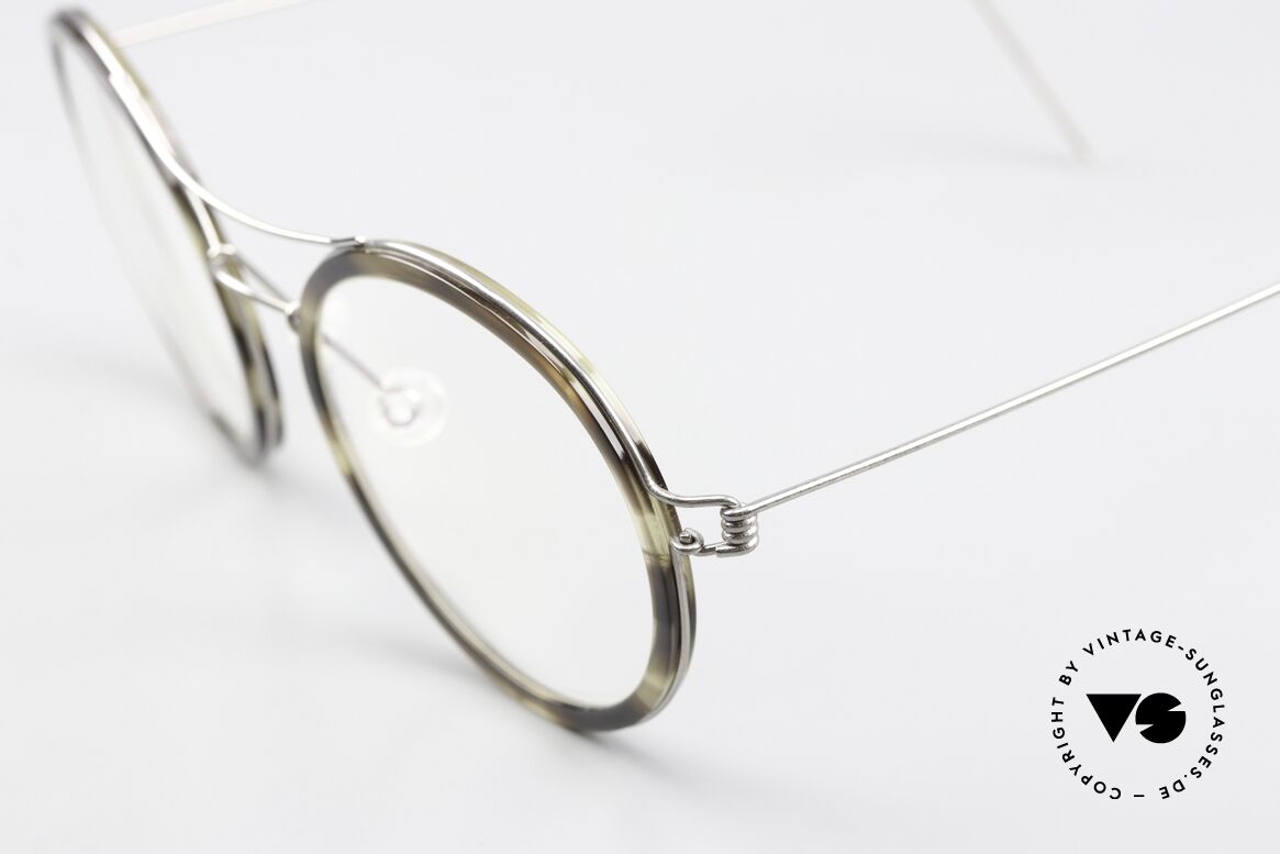 Lindberg Camilla Air Titan Rim Interesting Frame Coloring, striking refined Air Titan frame with Acetate inner rim, Made for Women