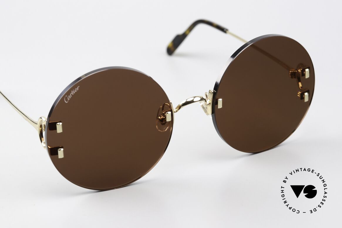 Cartier C-Decor Rimless Feminine Oversize Round, distinctive C-Decor temple hinges and square rivets, Made for Women