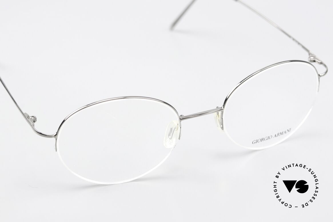 Giorgio Armani 27 90s Round Eyeglasses Nylor, elegant style; semi-rimless frame with nylon thread, Made for Men and Women