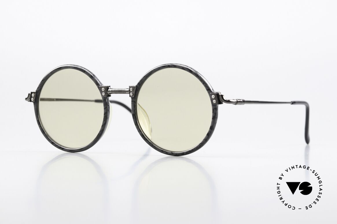 Jean Paul Gaultier 55-7261 Lenses Darken Automatically, unique round sunglasses by Jean Paul Gaultier, Made for Men and Women