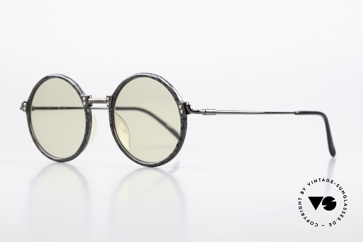 Jean Paul Gaultier 55-7261 Lenses Darken Automatically, mineral lenses automatically darken in the sun, Made for Men and Women