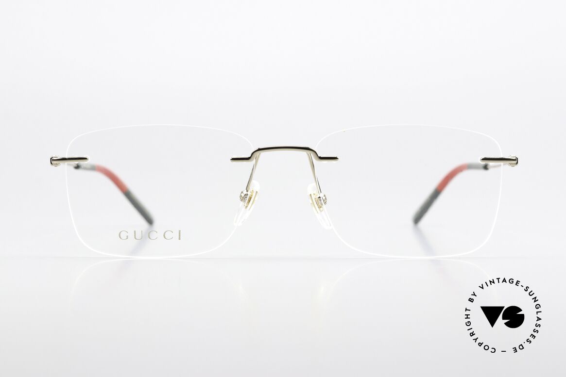 Gucci GG0399O Rimless Frame Made In Italy, gold-plated frame with temple ends in Gucci colors, Made for Men