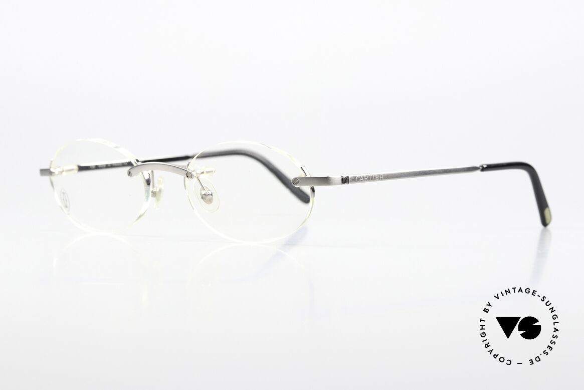 Cartier T-Eye Oval Titanium Frame Rimless, Cartier catalog reference number is T8100448, Made for Men and Women