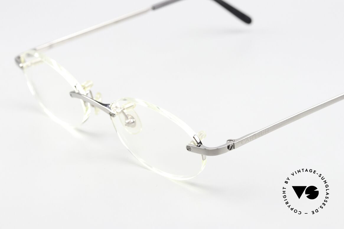 Cartier T-Eye Oval Titanium Frame Rimless, titanium frame with smooth platinum finish, Made for Men and Women