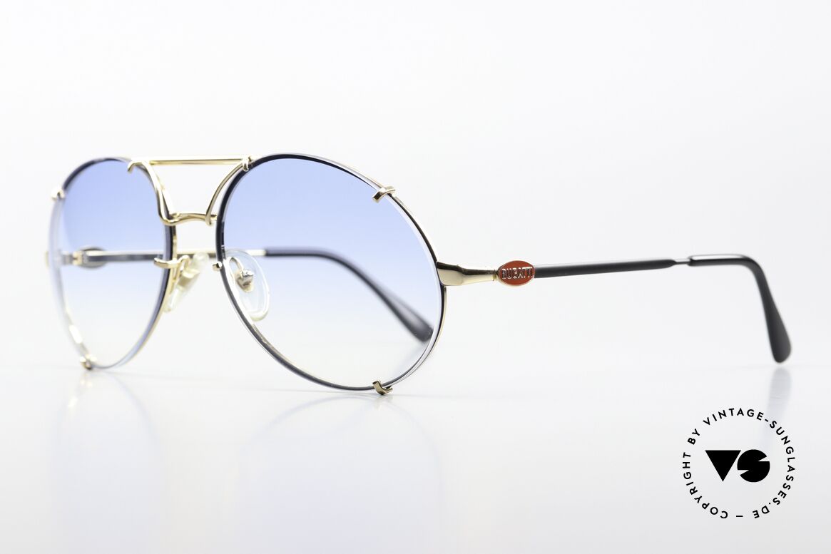 Bugatti 65822 80's Frame With Extra Lenses, 1 pair of lenses in brown-gradient & 1x blue-gradient, Made for Men Bugatti 65822 80's Frame With Extra Lenses, 1 pair of lenses in brown-gradient & 1x blue-gradient, Made for Men