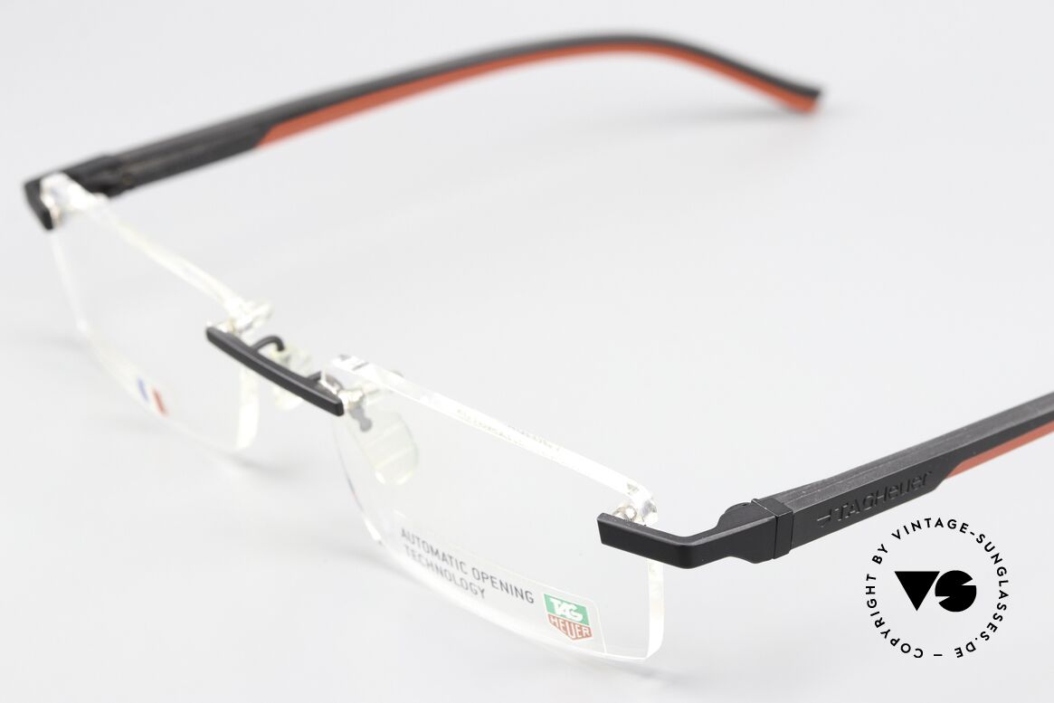 Tag Heuer 0842 Automatic Open Temples With One Hand, and the straight temples are covered with elastomer, Made for Men Tag Heuer 0842 Automatic Open Temples With One Hand, and the straight temples are covered with elastomer, Made for Men