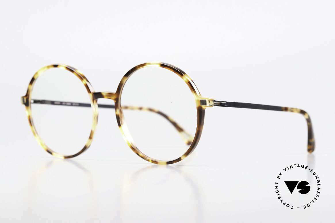 Mykita Anana Feminine Round Eyeglasses, color 916 is called 'Cocoa Sprinkles / Shiny Graphite', Made for Women