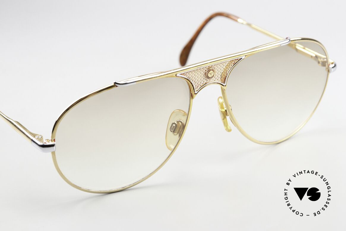 St. Moritz 404 Glasses With Jupiter Symbol, light brown gradient sun lenses (also wearable at night), Made for Men and Women St. Moritz 404 Glasses With Jupiter Symbol, light brown gradient sun lenses (also wearable at night), Made for Men and Women