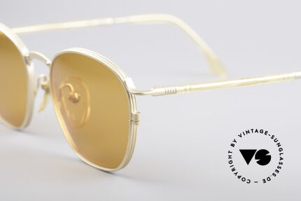 Jean Paul Gaultier 55-1271 Gold Plated Frame, a classic design with gaudy orange sun lenses, Made for Men and Women Jean Paul Gaultier 55-1271 Gold Plated Frame, a classic design with gaudy orange sun lenses, Made for Men and Women