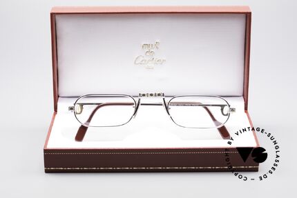 Cartier Demi Lune Santos Special Edition, rhodanized (silvered) frame with the golden Santos screws, Made for Men