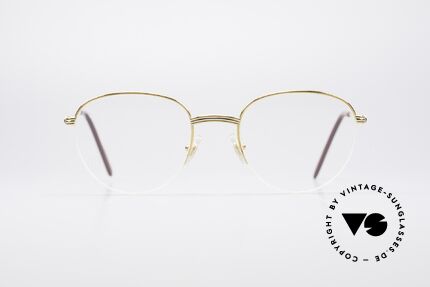 Cartier Colisee Round Luxury Eyeglasses, model of the 'Semi-Rimless' Collection by CARTIER, Made for Men and Women