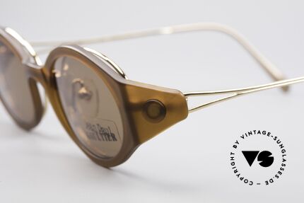 Jean Paul Gaultier 56-7202 Oval Frame With Sun Clip, classic oval metal frame with prominent plastic clip, Made for Men and Women