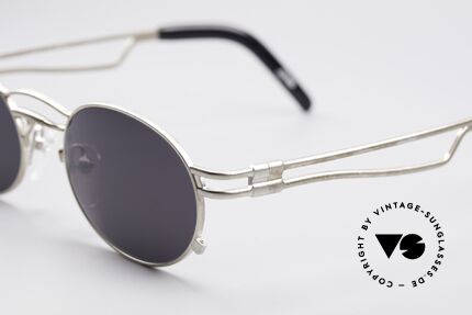 Jean Paul Gaultier 56-3173 Oval Designer Sunglasses, with dark gray sun lenses (for 100% UV protection), Made for Men and Women