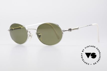 Jean Paul Gaultier 55-6101 Polarized Oval Sunglasses, POLARIZED sun lenses (for 100% UV protection), Made for Men and Women