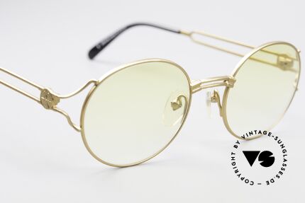 Jean Paul Gaultier 57-6102 Tupac All Eyez On Me Glasses, matt gold frame with fancy yellow-gradient sun lenses, Made for Men and Women Jean Paul Gaultier 57-6102 Tupac All Eyez On Me Glasses, matt gold frame with fancy yellow-gradient sun lenses, Made for Men and Women