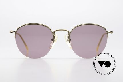 Jean Paul Gaultier 55-1172 Half Rimless Sunglasses, lightweight frame with numerous fancy details, Made for Men and Women