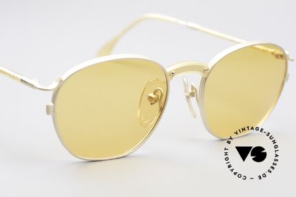 Jean Paul Gaultier 55-1271 Gold Plated Small Frame, a classic design with gaudy orange sun lenses, Made for Men and Women