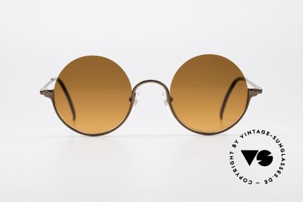 Jean Paul Gaultier 55-7163 Round Vintage Sunglasses, half rimless frame with sunset colored lenses, Made for Men and Women