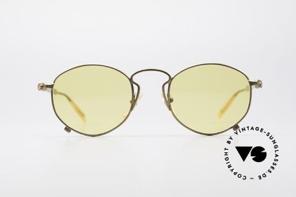 Jean Paul Gaultier 55-1171 Extraordinary Vintage Frame, extraordinary frame design with yellow lenses, Made for Men and Women