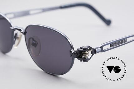 Jean Paul Gaultier 56-8102 Oval Industrial Sunglasses, blue-metallic and temple ends with a watch symbol, Made for Men and Women