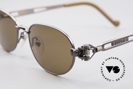 Jean Paul Gaultier 56-8102 Oval Steampunk Sunglasses, brownish-metallic; temple ends with a watch symbol, Made for Men and Women