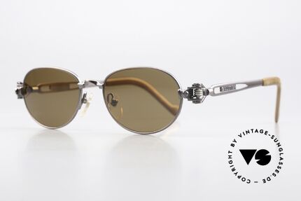 Jean Paul Gaultier 56-8102 Oval Steampunk Sunglasses, frame with some mechanical components / details, Made for Men and Women