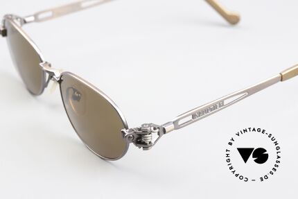 Jean Paul Gaultier 56-8102 Oval Steampunk Sunglasses, brownish-metallic; temple ends with a watch symbol, Made for Men and Women
