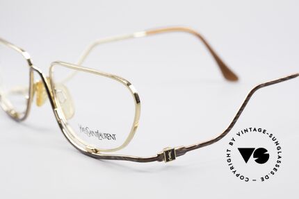 Yves Saint Laurent 4012 Y121 Extraordinary Frame, color code is Y121 = gold / gray-braun marbled, Made for Women