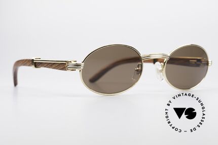Cartier Sully Oval Bubinga Wood Sunglasses, model of the legendary 'PRECIOUS WOOD' collection, Made for Men and Women