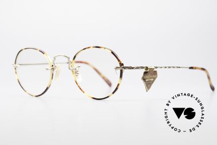 Oliver Peoples OP190G 1/10 12k Gold-Filled Frame, combined with the intellectual styling of the 1960's, Made for Men and Women