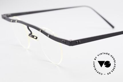 Theo Belgium Tita II 11 Titanium Vintage Eyeglasses, the clear DEMO lenses are fixed with screws at the frame, Made for Men and Women