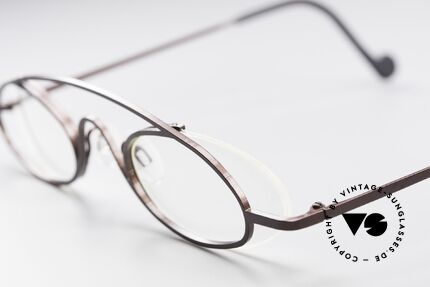 Theo Belgium Hababa Rimless Rimmed Frame Oval, an extraordinary designer piece by THEO BELGIUM, Made for Men and Women