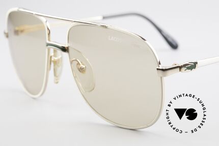 Lacoste 101 Lacoste Changeable Lenses, the lenses are lighter in the shade and darker in the sun, Made for Men
