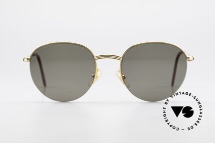 Cartier Colisee Round Luxury Sunglasses, model of the 'Semi-Rimless' Collection by CARTIER, Made for Men and Women