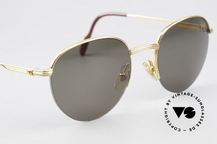 Cartier Colisee Round Luxury Sunglasses, functionality & pure lifestyle (Colisee = Colosseum), Made for Men and Women