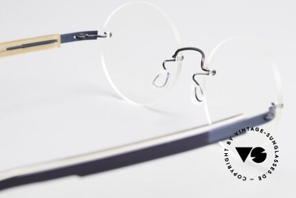 Lindberg 2111 Strip Titan Rimless Titanium Frame Round, minimalist design: free from screws, rivets and welds, Made for Men and Women