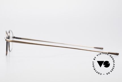 Oliver Peoples OP554 Rare Vintage Eyeglass-Frame, combined with the intellectual styling of the 1960's, Made for Men and Women