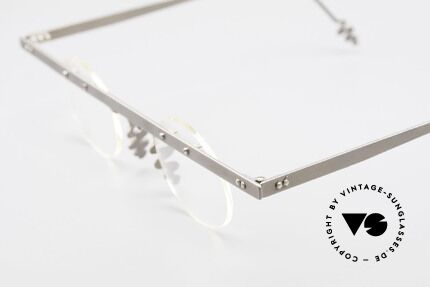 Theo Belgium Tita I3 90's Vintage Eyeglasses Titan, the clear DEMO lenses are fixed with screws at the frame, Made for Men