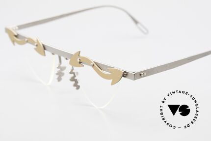 Theo Belgium Tita II Heart Shaped Eyeglasses Titan, the clear DEMO lenses are fixed with screws at the frame, Made for Women
