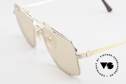 Dunhill 6068 Gold Plated Frame Changeable, changeable sun lenses (darken automatically in the sun), Made for Men