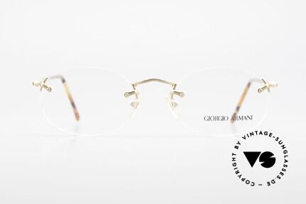 Giorgio Armani 197 Rimless Vintage Eyeglasses, rimless frame design with discreet elegant coloring, Made for Men and Women