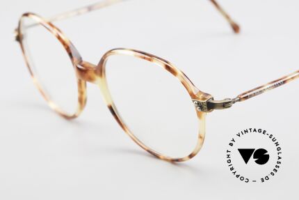 Giorgio Armani 334 Vintage Round Eyeglass-Frame, a brilliant combination of quality, design and comfort, Made for Men and Women