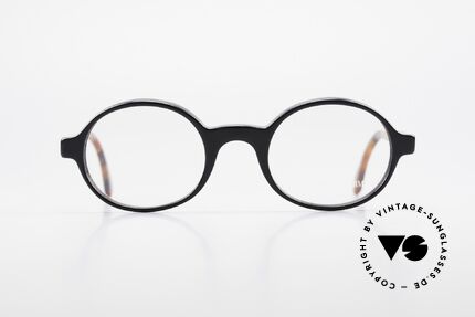 Giorgio Armani 308 Oval 80's Vintage Eyeglasses, oval frame design with black/brown mosaic temples, Made for Men and Women