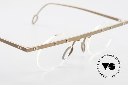 Theo Belgium Tita VII 9 Vintage Titanium Eyeglasses, the clear DEMO lenses are fixed with screws at the frame, Made for Men and Women