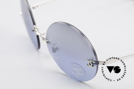 Chanel 4056 Round Luxury Shades Rimless, blue sun lenses are light-mirrored; 100% UV protection, Made for Men and Women