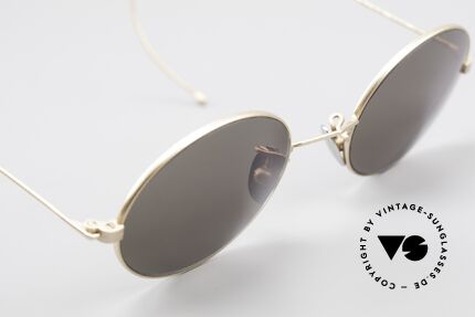 Cutler And Gross 0410 Oval Frame With Sports Temples, the quality frame could be glazed with prescriptions too, Made for Men and Women