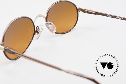 Bugatti 15769 Bronze Brown Metallic Frame, the fancy SUNSET sun lenses can be replaced optionally, Made for Men and Women
