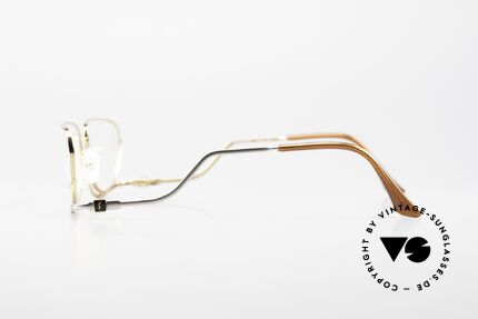 Yves Saint Laurent 4012 Y116 Extraordinary Eyeglasses, color code is Y116 = GOLD-PLATED / titanium, Made for Women