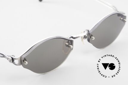 Jean Paul Gaultier 56-7111 Rimless Designer Sunglasses, solid gray plastic sun lenses (for 100% UV protection), Made for Men and Women