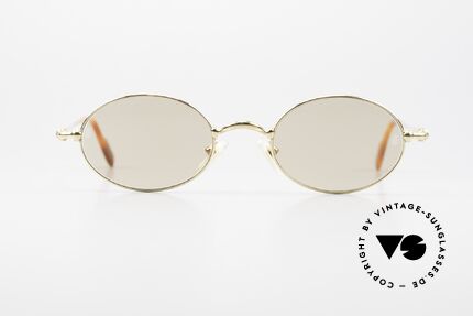 Cartier Filao Oval Luxury Sunglasses 90's, unisex model of the 'THIN RIM' Collection by Cartier, Made for Men and Women